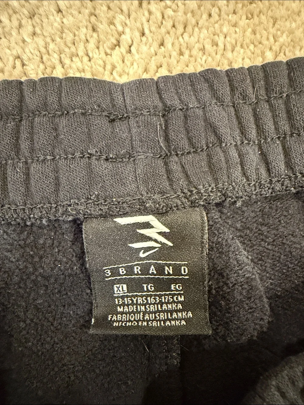 Nike Black Sweatpants with Gray Side Logo and White Swoosh